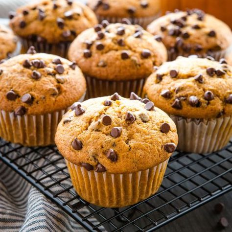 Best Ever Chocolate Chip Pumpkin Muffins - The Busy Baker Cranberry Roast, Vegetarian Mexican, Bean Enchiladas, Pumpkin Chocolate Chip Muffins, Simple Muffin Recipe, Pumpkin Chocolate Chip, Maple Glaze, Pumpkin Chocolate Chips, Pumpkin Muffins