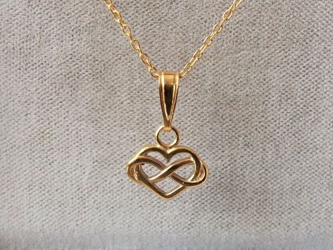 18ct Gold over Sterling Silver Infinity Heart Pendant Necklace heart pendant dimensions: 11mm wide x 20mm drop material: 18ct gold over sterling silver. Infinity Heart Pendant, Infinity Pendant Gold, Infinity Locket, Gold Ideas, Pearl Drop Pendant, Heart Pendent, Black Drop Earrings, Four Leaf Clover Necklace, Beautiful Gold Necklaces