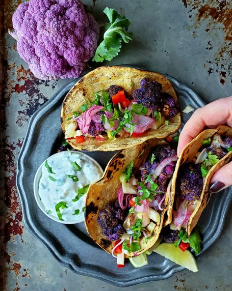 Taco Tuesday: Purple Cauliflower Tacos With Garlicky Yogurt Sauce Purple Cauliflower Recipe, Roasted Cauliflower Tacos, Purple Cauliflower, Lunch Restaurant, Cauliflower Tacos, Purple Food, Yogurt Sauce, Cauliflower Recipes, Taco Tuesday