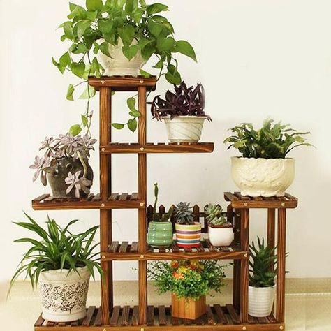 🎍5 Tier Wooden Plant Stand 🎍100% Brand New And High Quality.🎍Pre Drilled Holes.🎍Easy To Assemble.🎍This Plant Stand Will Be Ideal To Organize And Display Potted Plants In Your Home, Garden, Patio Or Terrace.🎍Crafted From Weather-Resistant Solid Wood, This Shelf Is Durable Enough To Be Used Outdoors Year Round.🎍The Ideal Art Piece To Decorate Your Yard.🎍You Can Set Different Plants Combination At Will For Its Multi-Tier Structure.🎍With 6 Racks - Place For A Decent Game Plan For Huge Numbe Wooden Plant Stands Indoor, Wooden Plant Stand, Outdoor Garden Planters, Garden Plant Stand, Wooden Plant Stands, Pot Stand, Decorated Flower Pots, Plant Stand Indoor, Plant Stands