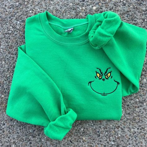 Custom Embroidered Grinch Crew Neck Unsex Sweatshirt Holiday Gift Christmas Gift Birthday Gift 50% cotton, 50% polyester, size unsex from XS to 5XL. Cricut Crew Neck Sweatshirt, Christmas Embroidery Sweatshirts, Embroidered Shirt Ideas, Embroidery Designs Sweatshirt, Grinch Smile, Green Lighting, Cozy Clothing, Grinch Face, Cute Shirt Designs