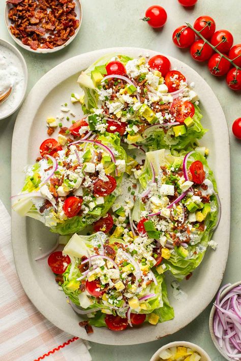 My take on the classic American restaurant salad is this BLT Wedge Salad Recipe! This perfect salad is packed with fresh produce, crisp bacon, and cheese crumbles served over crisp lettuce and topped with a high protein, mind-blowing dressing that brings it all together! Protein Ranch, Lettuce Wedge Salad, Wedge Salad Recipe, Blt Salad Recipe, Perfect Blt, Wedge Salad Recipes, Lettuce Wedge, Restaurant Salad, Blt Salad