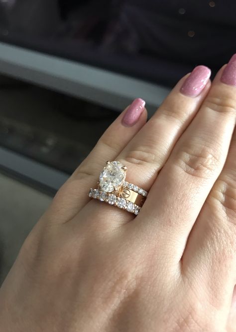 Oval Engagement Ring With Cartier Love Band, Cartier Wedding Ring Set, Oval Ring With Cartier Band, Gold Oval Engagement Ring With Band Stack, Cartier Love Ring With Oval Engagement Ring, Cartier Engagement Ring Stack, 3 Carat Wedding Ring Sets, Gold Ring Stack Wedding, Gold Wedding Stack Ring