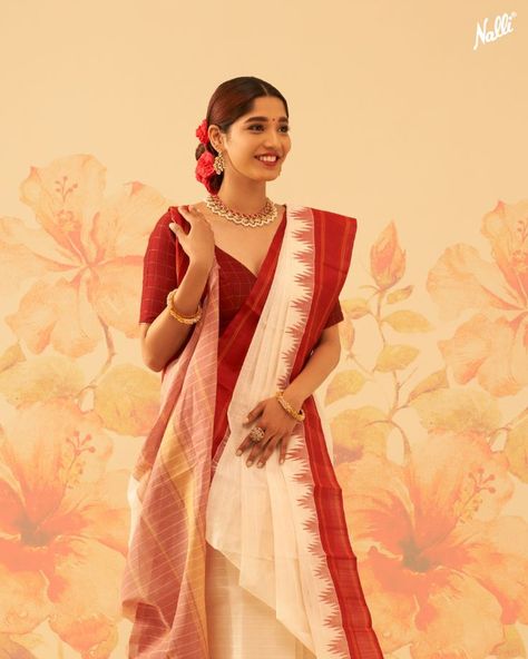 Presenting 𝐍𝐚𝐮𝐫𝐚𝐭𝐚𝐧
Colourful Silk Sarees Designed for Joyful Festivities💫

The auspicious white colour represents peace and spirituality, this Kanchipuram Cotton saree is elevated with a scintillating silk temple border. 💫 Patchwork, Saree White And Red, Bangla Culture, Saree Styling Ideas, Red And White Saree, Saree White, Saree Styling, Bengali Saree, Navratri Collection