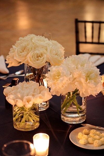 we can do a variety of soft white and cream florals on glass like these on the table (for the budget price we could around 6 vases) Lorde, White Flower Centerpieces, Simple Centerpieces, Deco Floral, Affordable Wedding, Centre Pieces, Website Link, Flower Centerpieces, Minimalist Wedding
