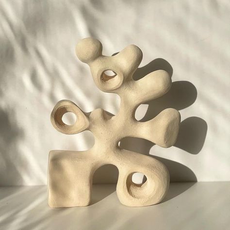 Carmelina | Ceramicist on Instagram: "The Oompa Loompa Sculpture 🤍 Love the White raku abstract sculpture with the organic finish🤍 H/36cm W/28cm #ceramics #pottery #sculptureabstract #sculpture #art #abstractart #oneofakind #unique #homedecor #decorhomestyle #interiordesign #interiorstyling #unglazedceramics #unglazed" Abstract Ceramics Pottery, Ceramics Abstract Sculpture, Pottery Abstract Ceramic Art, Subtractive Clay Sculpture, Clay Sculpture Art Project Ideas, Abstract Pottery Sculpture, Abstract Clay Sculpture Ideas, Abstract Ceramic Art, Organic Sculpture Abstract