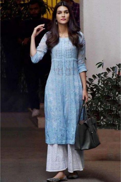 Kiara Advani, Kriti Sanon to Sara Ali Khan: 6 Times celebs opted for Chikankari kurtas for an off duty look | PINKVILLA Chikenkari Dress Anarkali, Anarkali Chickenkari, Light Blue Kurti Design, Palazzo Suits Indian Casual, Light Blue Indian Dress, Light Blue Salwar Suit, Light Blue Traditional Dress, Indian Casual Fashion, Light Blue Chikankari Kurta