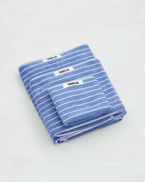 Terry towel – striped – Clear Blue Stripes | Tekla Fabrics Tekla Fabrics, Pool Pillow, Eclectic Bathroom, Natural Detergent, Gift Envelope, Striped Towels, Towel Collection, Terry Towel, Packaging Design Inspiration