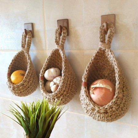 Description: Hand-woven from high quality materials, this hanging basket stores vegetables and fruit and the basket is well ventilated for long storage. Featuring a special teardrop shape, this hanging basket is very decorative and can be matched with most decorative styles, adding a touch of natural charm to your home and is very eye-catching. It is made of high quality braid fabric material. There are 6 different sizes for you to choose. This wall baskets are perfect for onions, garlic, potato Onion Storage, Hanging Wall Baskets, Small Pantry Organization, Food Type, Hanging Fruit Baskets, Jute Hanging, Organizing Hacks, Rustic Kitchen Decor, Boho Kitchen