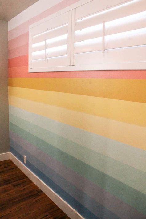 horse inspired girl room with a rainbow mural. Ideas and decor that kids will love. Plus an easy diy for painting a striped and colorful pastel featured wall to get a bedroom to match your aesthetic. Rainbow Board And Batten, Rainbow Mural Bedroom, Girls Bedroom Wall Paint Ideas, Rainbow Shiplap Wall, Girls Bedroom Wall Ideas, Bedroom Wall Paint Ideas, Rainbow Mural Wall, Easy Mural Ideas Diy, Bedroom Wall Color Ideas