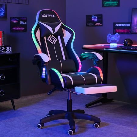 OUR GAMING CHAIR IS WRAPPED IN HIGH-QUALITY LEATHER IN A SLEEK, RACE-INSPIRED SHAPE, PROVIDING AN IMMERSIVE GAMING EXPERIENCE AND EXTRA COMFORT FOR LONG-PERIOD WORKING OR GAMING. PERFECT FOR YOU TO PLAY COMPUTER GAMES, WATCH TV, DO THE WORK, OR HAVE A REST. DON'T MISS IT, YOU DESERVE IT. Feature: COLORFUL RGB LED LIGHTS: Designed with LED flashing lights on the back and the edge of the seat, you can easily adjust multiple lighting modes and brightness by remote control, creating a more dynamic feel in your gaming room while playing. 2-POINTS Lumbar Massage: The massage gaming chair features two motors in the waist cushion position for lumbar massage function, providing you ultimate comfort and relaxation. ERGONOMIC DESIGN: Strong metal frame designed to help promote a comfortable seated po Music Office, Chair With Footrest, Leather Recliner, Computer Chair, Bluetooth Speakers, Lumbar Support, Rgb Led, Gaming Chair, Office Chair