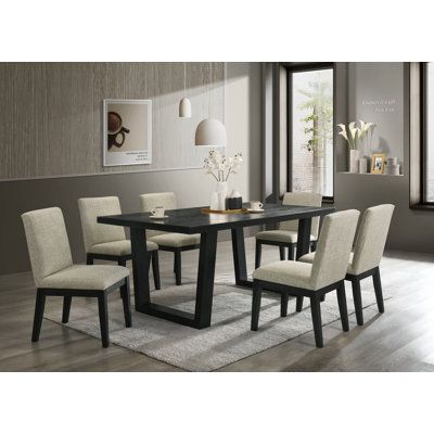 Instantly set up your dining room or kitchen with this beautiful all wood table and chairs set. The table is all wood with a beautiful satin wood finish for everyday use. Chairs are comfortable high back for comfort. This stylish table and chairs set is ideal for dinette, kitchen, and dining areas. Whether hosting a relaxed dinner party with close friends or enjoying an everyday meal with the family this elegant wood dining set is a must-have for your home. Crafted from solid and engineered wood Dinette Tables And Chairs, Dark Dining Room Table Ideas, Dining Room Table Setting Ideas Modern, Beige And Black Dining Room, Wood Dinner Table Modern, Black Dinner Table, Black Dining Table And Chairs, Contemporary Dining Room Ideas, Elegant Dining Room Decor