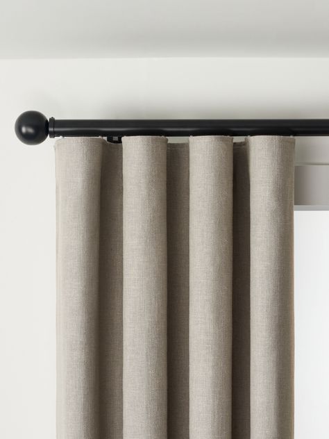 Behind every great pair of curtains is an even better curtain pole. It's important not to neglect this part of your window dressing as, without even realising it, the pole provides support both in the obvious structural sense, but also in terms of complementing your decor. Designed and made here in the UK our premium Select Curtain Poles are a fantastic option. Here's why: They're made from high-quality steel and/or aluminium that will support all curtain weights, from breezy voile panels to hea Black Rod Curtains, Black Curtain Pole, Black Curtain Rod, Black Curtain Rods, Drapery Styles, Wave Curtains, Curtain Weights, Voile Panels, Dining Room Curtains