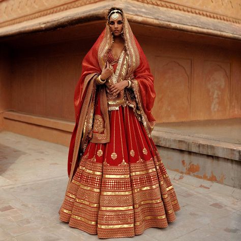 Sabyasachi (@sabyasachiofficial) needs no introduction–the maestro of wedding couture that every bride dreams of on her D-day. Yes, that's the power and popularity of the Kolkata-based couturier. Changing the scape of Indian wedding fashion year after year, ace designer Sabyasachi Mukherjee has yet again left us in awe with his newest drop, Heritage Bridal 2022. TAP LINK IN BIO 🔗 To take your bridal couture to new heights Sabyasachi Lehenga Cost, Sabyasachi Lehenga Bridal, Sabyasachi Collection, Sabyasachi Bridal, Latest Bridal Lehenga, Sabyasachi Lehenga, Indian Bride Outfits, Bridal Lehenga Collection, Bride Outfits