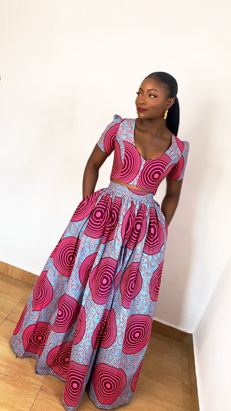 Traditional Dresses Skirts And Top, 2 Piece African Dress, Long Skirt Ankara Styles, Ankara Long Flare Skirt And Crop Top, Ankara Two Piece Outfit Skirt Maxi, Two Piece Kitenge Outfit, Top And Skirt Outfit Ankara, African Top And Skirt Styles, Pink African Print Dress