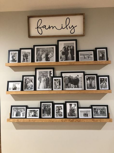 Mantle Family Picture Decor, Home Decor With Photos, How To Style A Blank Wall In Living Room, Blank Wall Decor Living Room, Rustic Photo Wall Living Room, Wood Lattice Wall Decor Ideas, Living Room Decor With Family Pictures, Halloween Picture Ledge, Picture Ledge Ideas Hallway