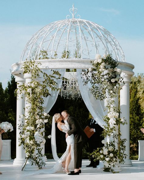 march 9, 2024. the most magical day of my life. it still feels like i’m dreaming 🤍✨☁️🕊️💍 Pergolas, Gazebo Wedding Decorations Simple, Wedding Gazebo Flowers, Wedding Ceremony Gazebo, Gazebo Ceremony, First Kiss Wedding, Gazebo Wedding Decorations, Wedding Drapery, Fake Flowers Wedding