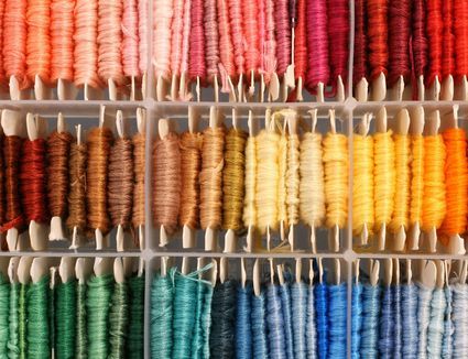 Needlepoint uses different yarns and threads than other crafts. Learn how to select yarns and threads for your projects with this basic tutorial. Winding Yarn, Yarn Wig, Crochet Wig, Dmc Embroidery, Colorful Embroidery, Dmc Embroidery Floss, Thread & Yarn, Needlepoint Stitches, Craft Room Organization