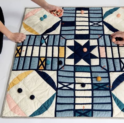 Haptic Lab Just Launched Board Game Quilts, and They're Genius | Apartment Therapy Patchwork, Felt Games, History Of Quilting, Charm Pack Quilt, Fabric Board, Circle Game, Board Game Design, Circle Quilts, Machine Quilting Designs