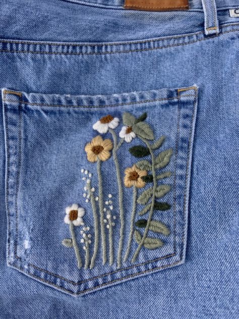 Embelishing a pretty bland jean skirt! #backpocket #jeanembroidery #embroidery #jeans #jeanskirt #pocket #flowerembroidery #floralembroidery #flowers Couture, Jeans Embroidery Pocket, Embroidery Designs On Pocket, Embroidery Skirt Ideas, Jean Pocket Embroidery Flowers, Embroidered Jeans Pocket Flowers, Jeans Stiches Ideas, Jean Skirt Embroidery, Jeans Back Pocket Embroidery