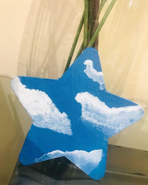 Himanshi Rai on Instagram: “The sky is the soul of all scenery☁️💙 . . Material used Mini star shaped canvas- @itsybitsycraftstore Paint brushes- @camlin_official…” Star Shaped Canvas Painting, Painting Ideas On Canvas Mini, Star Painting Canvas, Star Painting Ideas, Star Canvas Painting, Alien Stage, Star Painting, Painting Inspo, Acrylic Keychain