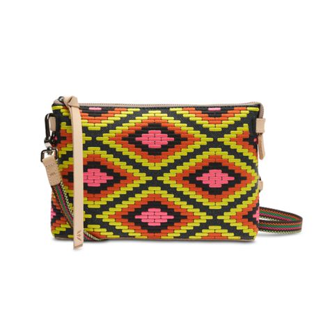 Keep your phone, keys, and wallet in this take-anywhere crossbody! An open pocket and a credit card slot pocket make this embroidered crossbody bag a go-to for heading out the door. DETAILS & SIZING Rae embroidered exterior Zipper closure Interior slide pocket and credit card slots Includes detachable and adjustable woven crossbody strap Trimmed in natural, untreated leather 8 ¼" (W at the base), 9 ¼” (W at the top) x 5 ¾” (H) x 2" (D), 14 ½”-27 ½” adjustable crossbody strap drop Made in Mexico Mexico, Swimsuit Jewelry, Drinking Accessories, Sneaker Slippers, Candle Party, Jeweled Earrings, Sock Shop, Scarf Hat, Cool Backpacks