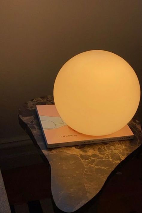 Round FADO lamp sitting on top of a marble table. Misshaped Mirror, Pfp Butterfly, Bedroom Lamp Ideas, Bedroom Lamps Ideas, Bedroom Lamps Ceiling, Ikea Fado, Bedroom Lamp Ceiling, Bedroom Lamps Bedside, Butterfly Room Decor