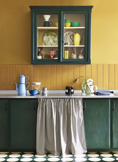 Whether you prefer English or French varieties, mustard belongs on more than just your condiments shelf in the kitchen this autumn. Why not add a dash of warmth to your crockery? Choosing a statement mustard teapot or tea towels is a simple, transient way to try the colour. Image credit: Annie Sloan Yellow Kitchen Cabinets, Mustard Yellow Kitchens, Yellow Painted Walls, Yellow Kitchen Walls, Mustard Yellow Walls, Colourful Kitchen, Green Kitchen Cabinets, Green Cabinets, Yellow Kitchen