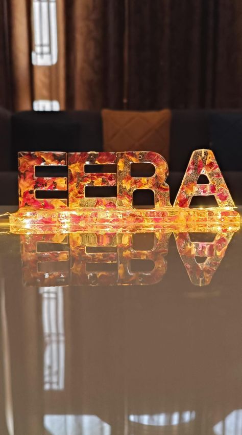 Resin Name stand of name EERA, light name stand, base of 6 inch, 4 letter name stand made from resin, preserving rose petals, led light or fairy light or cork light, Resin Initials stand , alphabet stand, dried rose petal stand of epoxy, epoxy frame, birthday gift ideas, handmade gift ideas, anniversary gift ideas, gift ideas for girlfriend, gift ideas for boyfriend, wedding gift ideas, each letter of 1.5 inch, aesthetic name stand, Simple and easy handmade name stand Resin Name Stand, Birthday Gift Ideas Handmade, Epoxy Frame, Ideas For Girlfriend Gift, Aesthetic Name, Cork Light, Frame Birthday Gift, Cork Lights, Gift Ideas Anniversary