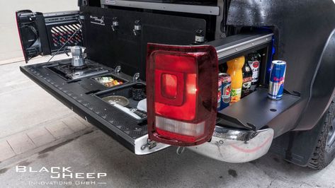 Swiss adventure outfitter Black Sheep Innovations has cooked up one of the coolest truck mods I’ve seen in some time–taillights that pop out to reveal secret storage areas. A mobile mini-bar, to be exact. Neat! Truck Accesories, Cool Truck Accessories, Truck Bed Storage, Truck Tools, Overland Truck, Truck Storage, Truck Mods, Vw Amarok, Car Camper