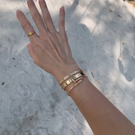 Wrist Jewelry Stack, Gold Bangle Stacking Ideas, Cartier Wrist Stack, Stacking Bracelets With Watch, Bracelet Layering Ideas Gold, Cartier Love Cuff Bracelet, How To Layer Bracelets With A Watch, Bracket Stack Ideas, Everyday Jewelry Stack