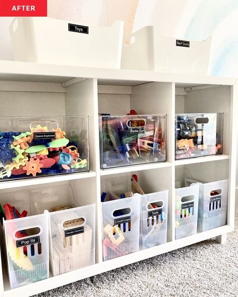 white cubby storage shelves, storage bins with labels, storage bins on top of shelves, rainbow mural, carpet Organisation, Santos, Functional Toy Storage, How To Organise Toys, Toy Cube Organization, Kids Art Supplies Organization, Cubby Organization Ideas, Organizing Toddler Toys, Playroom Organization Small Space