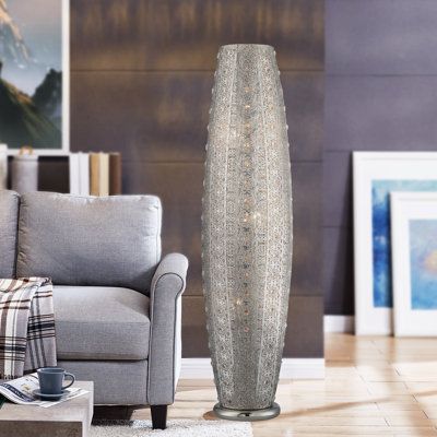 Revel in the sheer opulence of this 3-lights polished silver column floor lamp! Handcrafted with eye-catching filigree details, this distinctive oval floor lamp also features beveled crystal bead decorations which diffract light in brilliant fashion. A polished chrome metal base and an on-off foot switch give the lamp an unencumbered design. Add this lamp to any space for instant glam points, and watch as its presence spark conversations and complements. | Everly Quinn Quinlan 43" Column Floor L Light Flooring Living Room, Bead Decorations, Crystal Living Room, Three Light Floor Lamp, Corner Floor Lamp, Novelty Floor Lamp, Floor Lamp Grey, Column Floor Lamp, Floor Lamp Shades