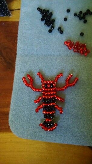 Beaded crawfish pendant (altered lobster pattern) Small Bead Crafts, Beaded Animals Patterns, Bead Pets Pattern Easy, Bead Pets Pattern, Bead Animals Patterns Easy, Bead Animals Patterns, Beaded Lobster, Bead Creatures, Beads Animals
