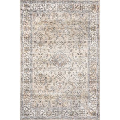 This indoor area rug captures a timeless style with a more updated, the casual vibe we love. It’s power-loomed from polyester, and it showcases a floral-inspired motif in faded hues of ivory and peach for a lived-in look. This rug has a stain-resistant design that stands up to the occasional spill and coffee splash. Plus, it features a medium 0.39" pile height, so it's ideal for low-traffic spaces like your bedroom or nursery while also being easy to clean. To keep it in place, we recommend pair Nuloom Rugs, Area Rug For Living Room, Washable Area Rug, Busy Lifestyle, Rug For Living Room, Floor Covering, Stain Resistant Fabric, Washable Area Rugs, Orange Grey