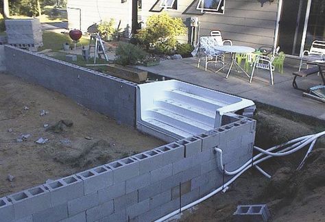 Building your own swimming pool with cement blocks isn’t hard, according to Darrell Buchholz. He built one for a friend, and now sells plans for others to do the same.     “I built a pool for myself ... Diy Pool Steps, Homemade Swimming Pools, Cement Pools, Build Your Own Pool, Pool Plumbing, Living Pool, Building A Swimming Pool, Swimming Pool Decks, Swimming Pool Construction