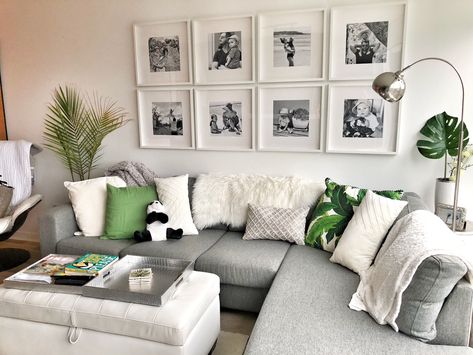 How to create a beautiful gallery wall of family photos Family Potraits Idea Living Room, Photo Wall Lounge, Photo Living Room Wall, Picture Frames In Living Room, Photo Gallery Over Couch, Photo Wall Lounge Room, Lounge Photo Wall Ideas, Family Portrait Decor Living Rooms, Picture Wall Ideas Over Couch