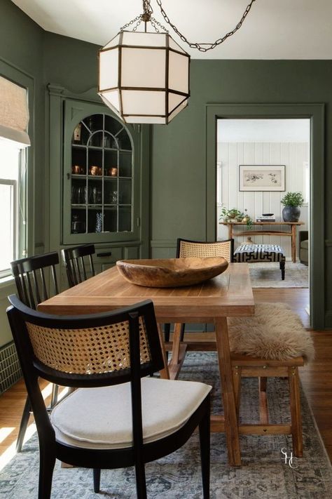 Searching for dark or olive green dining room ideas? Check out this dark green dining room walls featured in our Franklin Refresh design featuring wooden table and black chairs. See more at www.stonehousecollective.com Green Dining Room Walls, Room Ideas Dark, Moody Dining Room, Dark Dining Room, Green Accent Walls, Green Dining Room, Dark Green Walls, Suzanne Kasler, Grey Dining Room