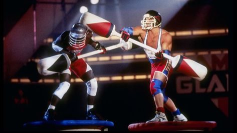 Where Are They Now? The Original 6 American Gladiators | Mental Floss 90s Television, Billy Blanks, American Gladiators, Curb Your Enthusiasm, Patrick Swayze, Saved By The Bell, Pro Wrestler, Ensemble Cast, Nike Air Force Ones