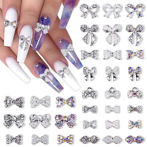 PRICES MAY VARY. 🎀【3D Bow Nail Charms】: 33 pieces silver bow nail charms. It contains 11 styles, and each style has 3 types (iridescent diamond, clear diamond and pearl). Multiple choice, gives you different nail design every time. 🎀【Exquisite Design】: These nail studs are designed as bow shaped, decorated with fake diamonds or pearls, looks shine and sparkle. You can just use your imagination to decorate your nails as you want, every single one would make you more elegant and attractive. 🎀【H Nail Bow, Nails Bow, Charms For Nails, Nail Studs, Bow Nail Art, Bow Nail, Different Nail Designs, Studded Nails, Rhinestone Material