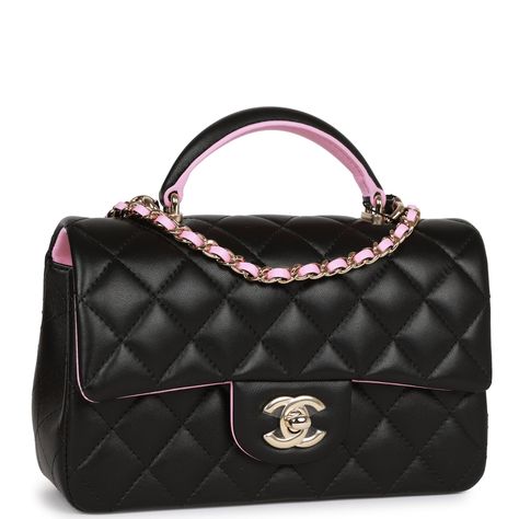 This Mini Rectangular flap bag is in Black lambskin with light gold tone hardware and has a front flap with signature CC turnlock closure, rear half moon pocket, black and light pink top handle and single interwoven light pink leather and light gold tone chain link shoulder/crossbody strap. The interior is lined in light pink leather and features a zipper pocket with Chanel pull and an open pocket below. Collection: 23P Origin: France Condition: Pristine; new or never worn Accompanied by: Chanel Black Designer Bags, Chanel Mini Rectangular, Light Pink Top, Tas Chanel, Sacs Design, Luxury Bags Collection, Light Pink Tops, Chanel Box, Chanel Mini