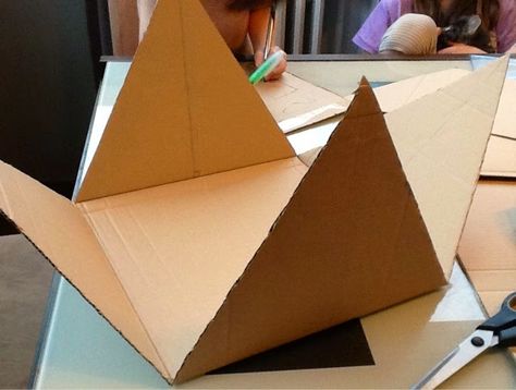 Cardboard Pyramid, Pyramid Project Ideas, Pyramid School Project, Ancient Egypt Display, Egypt Display, Pyramid Project, Egypt Vbs, Ancient Egypt Crafts, Ancient Egypt Activities