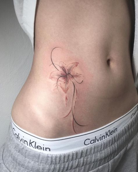 Floral Stomach Tattoo Design, White Tattoo Jellyfish, Tattoo Ideas On Side Of Stomach, Flower On Stomach Tattoo, Plus Est En Vous Tattoo, Neckline Tattoos For Women, Water Theme Tattoos For Women, Matching Weird Tattoos, Complicated Tattoo Designs