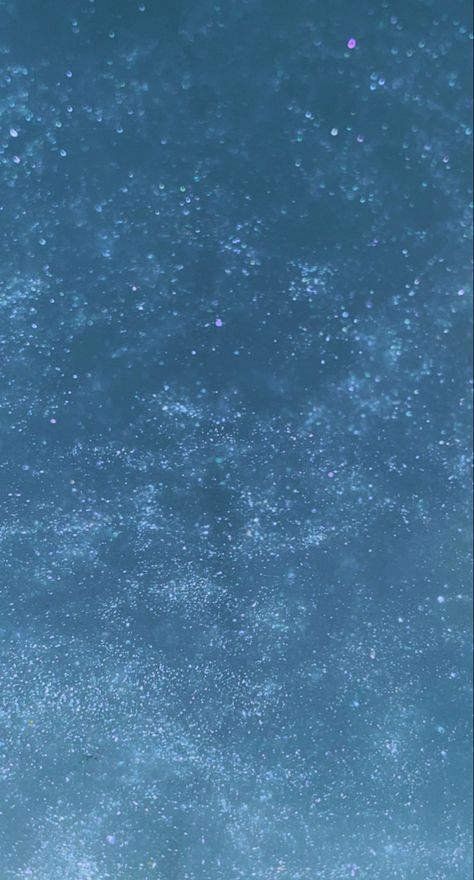 Blue glitter wallpaper. Picture of glitter in water. The color is blue. Light blue. Light Blue Sparkle Background, Blue 2000s Aesthetic Wallpaper, Light Blue Asthetics Wallpers, Light Blue Asthetics Photos Wallpaper, Blue Sparkles Aesthetic, Glitter Water Aesthetic, Light Blue Glitter Aesthetic, Aqua Blue Aesthetic Wallpaper, Light Blue Asthetic Wallpers