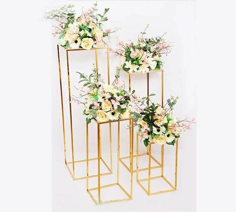 "Gold wedding decoration 4pcs/set Iron geometric placed props road lead T station supplies rectangle wedding plinth Process: Electroplating process Sizes: 15.7\"/ 23.6\"/ 31.4\"/ 39.3\" Size is approximate due to manual measurements. Color: Gold Material: metal Style Options: 4 piece with no shelf. 4 Piece with acrylic glass shelves. 4 Piece with metal shelves. Note: In order to control damages during transportation, the product will ship disassembled & will require assembly for use. Not to Table Centerpiece Flower, Wedding Vase Centerpieces, Floor Vases, Aisle Runner Wedding, Gold Wedding Decorations, Flower Stand, Geometric Wedding, Geometric Flower, Hula Hoop
