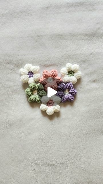 Jackie Visser’s Crochet on Instagram: "🌸Puff Crochet Flower🌸  I love these little puff flowers. 😍 There are so many things you can make with them. I've seen them used in bags, blankets, sweaters, headbands, and hats. What would you make using these? Whatever you decide to make these are on trend for summer 2024! 🌸🌼  #crochettutorial #crochetflower #crochettrends #summercrochet" Puff Stitch Flower Blanket, How To Make Puffy Crochet Flowers, Crochet Bubble Flower Pattern, Crochet Flowers For Headbands, Crochet Headband Flower, Puff Flower Crochet Blanket, Flower Puff Crochet, Crochet Puffy Flowers, Puffy Flower Crochet