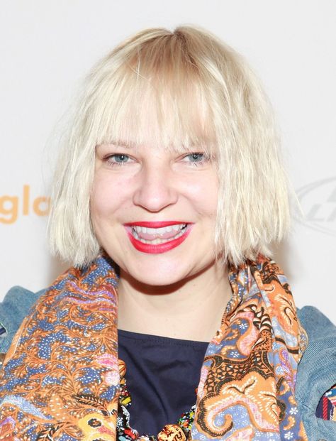 Why Does Sia Cover Her Face With a Wig? Here’s the Answer | Allure Sia Singer, Sia Kate Isobelle Furler, Sia And Maddie, Music Rules, The Fame Monster, Neo Soul, Dear Mom, Beautiful Prom Dresses, Famous Singers