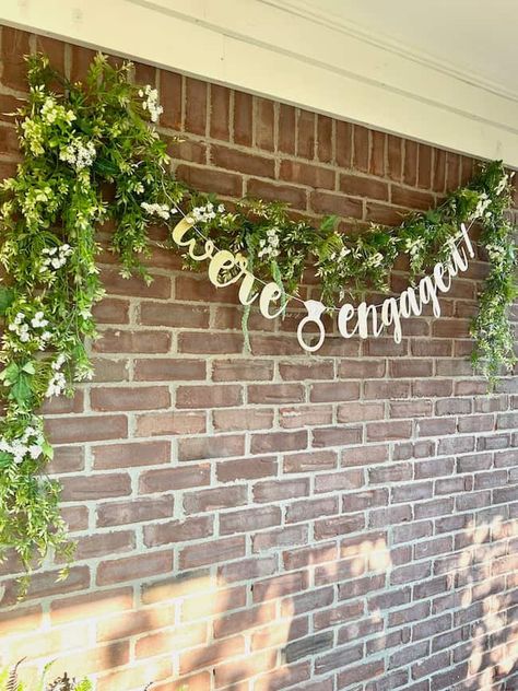 The Best Backyard Engagement Party Ideas and Tips - Perfecting Places Engagement Backdrop Ideas Diy, Eucalyptus Engagement Party, Engagement Party House Decor, Small Engagement Party Themes, Engagement Party Family, Enchanted Engagement Party, Engagement Party Outside Decor, Country Engagement Party Ideas, Happy Hour Engagement Party