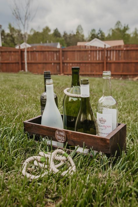 Outdoor Wedding Lawn Games, Engagement Party Ring Toss, Wedding Cocktail Hour Lawn Games, Wedding Ring Toss Game, Wine Bottle Ring Toss, Wedding Outdoor Cocktail Hour, Backyard Engagement Party Games, Engagement Party Backyard Decorations, Wine Yard Wedding