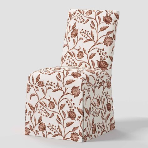 Whether you're eating dinner as a family or hosting guests for a special occasion, the Logan Dining Chair Slipcover from Threshold™ will add a beautiful look to your dining space. This armless dining chair features a slanted back and comes with a floral-print slip cover for appealing style that coordinates well with most of your existing decor. Set on a wooden frame, this 100% cotton dining chair provides a comfy sitting option for enjoying long conversations with loved ones while dining. Thresh Southern Dining Room, Slip Covered Dining Chairs, Dining Chair Slipcover, Host Chairs, Dinner Chair, Slipper Chairs, Chair Slipcover, Hosting Guests, Dinning Chairs